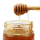 Barra de madera natural de la agitación de la miel de la miel del lioso de la cuchara de la miel de la barra de madera del chapoteo