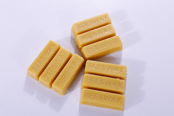 comprar nivel amarillo natural puro de la comida de las barras 28g de la cera de abejas del 100% fabricación en línea