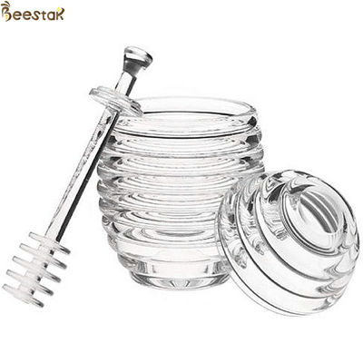 comprar Dos tipos pote y cuchara transparentes de la miel de la abeja con el revolvimiento tarro cristalino de la miel de Rod del mini fabricación en línea