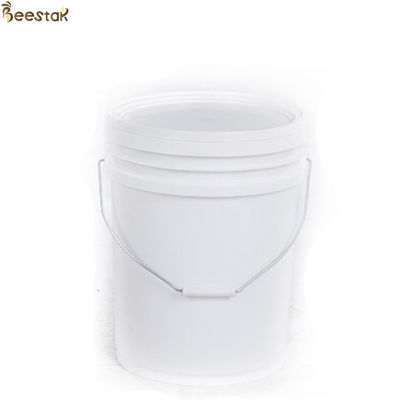 comprar Tanque de miel de plástico amarillo blanco con puerta de miel para almacenamiento de miel fabricación en línea