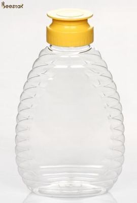 comprar Botellas plásticas especiales al por mayor del precio de fábrica 375ml Honey Jar And Spoon Plastic para la miel fabricación en línea