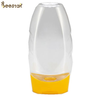 comprar Precio de fábrica plástico de la categoría alimenticia Honey Jar And Spoon plástico especial 335ml vacío fabricación en línea