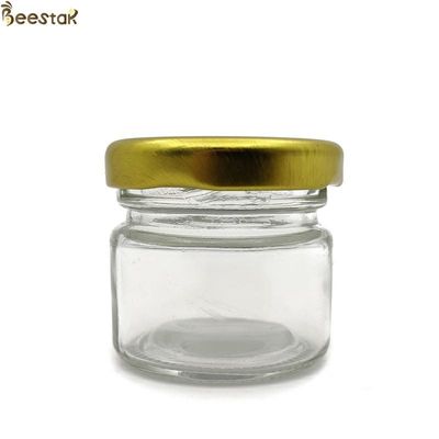 comprar vidrio de cristal Honey Bottles del tarro de la miel 25ml del almacenamiento vacío a granel de cristal de los tarros fabricación en línea