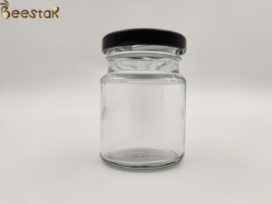 comprar botella de la jerarquía del pájaro de 50ml 75ml alrededor de Honey Pot Glass Container Bottles de cristal con la tapa negra fabricación en línea