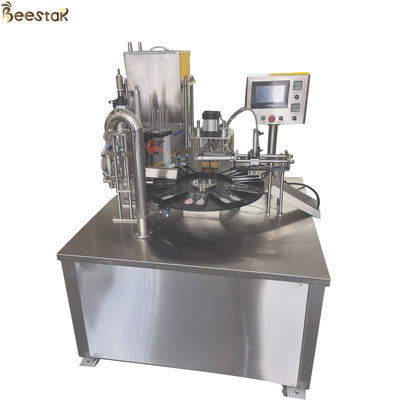 comprar Llenador automático de Honey Packing Machine Honey Bottle de dos cucharas SS304 fabricación en línea