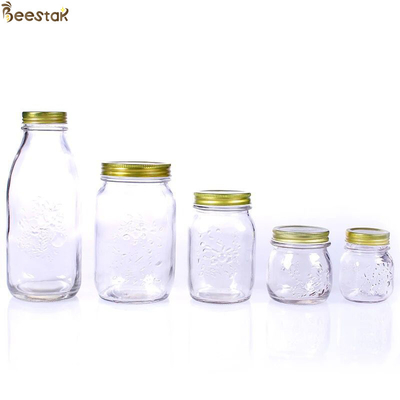 comprar Flor tallada Honey Glass Jar And Spoon Honey Container transparente fabricación en línea
